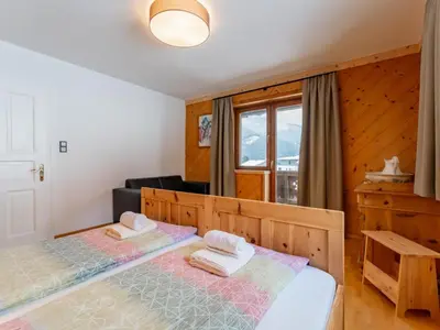 Ein Bett oder Betten in einem Zimmer der Unterkunft Kaiser