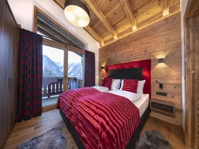 Ein Bett oder Betten in einem Zimmer der Unterkunft Chalet Retreat near Kitzbuhel Alps