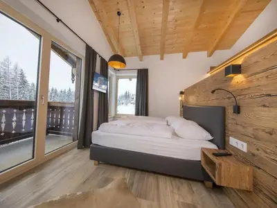 Ein Bett oder Betten in einem Zimmer der Unterkunft Chalet near Wildkogel Arena