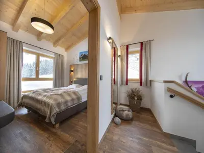 Ein Bett oder Betten in einem Zimmer der Unterkunft Luxury Chalet with Views and Sauna