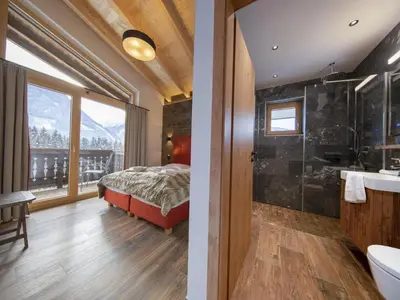 Ein Bett oder Betten in einem Zimmer der Unterkunft Luxury Chalet with Views and Sauna
