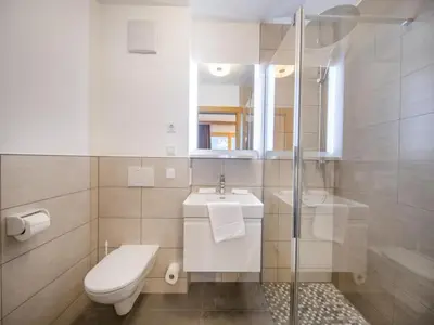 Ein Badezimmer in der Unterkunft Modern Chalet near Zillertal Arena