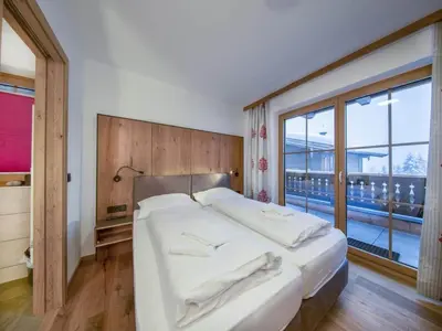Ein Bett oder Betten in einem Zimmer der Unterkunft Chalet with shared swimming pool