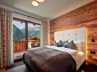 Ein Bett oder Betten in einem Zimmer der Unterkunft Chalet near Ski Lift with Garden