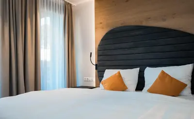 Ein Bett oder Betten in einem Zimmer der Unterkunft Peak Stay Wildschönau