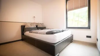 Ein Bett oder Betten in einem Zimmer der Unterkunft Wohnen im Krafttal Kelchsau