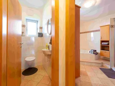 Ein Badezimmer in der Unterkunft Dorfvilla Niedernsill