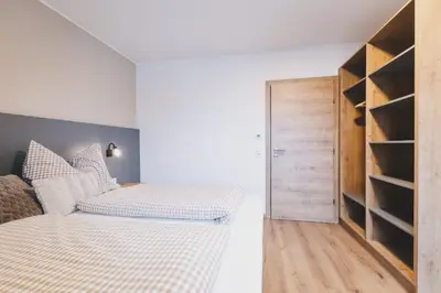 Ein Bett oder Betten in einem Zimmer der Unterkunft Dorfvilla Niedernsill