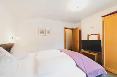 Ein Bett oder Betten in einem Zimmer der Unterkunft Das Jennerwein Appartement