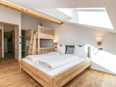 Ein Bett oder Betten in einem Zimmer der Unterkunft Hopfgarten Alpin Living Top 5