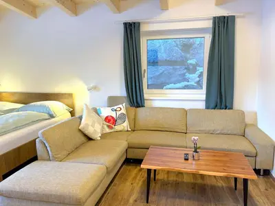 Ein Sitzbereich in der Unterkunft Apartment Haus Stöckl by Interhome