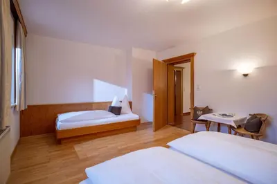 Ein Bett oder Betten in einem Zimmer der Unterkunft Apart Astner