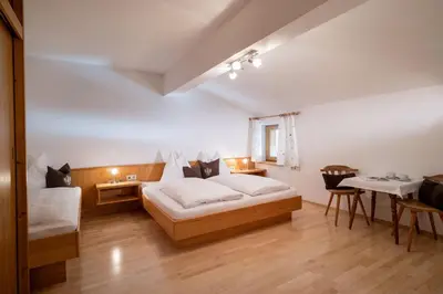 Ein Bett oder Betten in einem Zimmer der Unterkunft Apart Astner