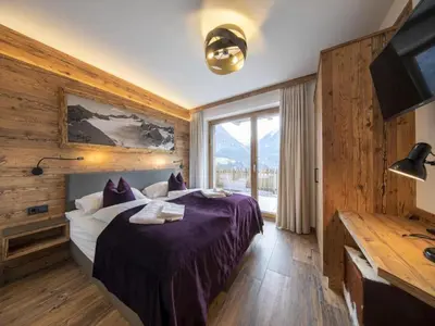 Ein Bett oder Betten in einem Zimmer der Unterkunft Chalet with ski access, Neukirchen