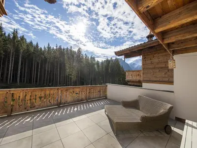 Ein Balkon oder eine Terrasse in der Unterkunft Chalet in Neukirchen by the Ski Area