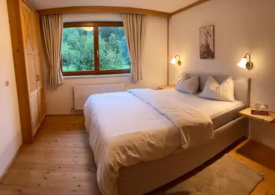 Ein Bett oder Betten in einem Zimmer der Unterkunft Haus Widmoser
