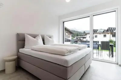 Ein Bett oder Betten in einem Zimmer der Unterkunft 21trees