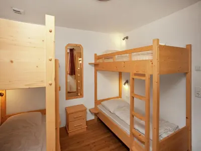 Ein Bett oder Betten in einem Zimmer der Unterkunft Chalet in Königsleiten near Ski Bus, Pool