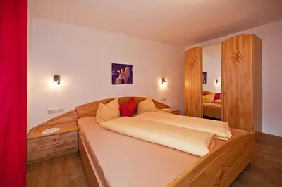 Ein Bett oder Betten in einem Zimmer der Unterkunft Apartment Oberbichl