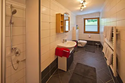 Ein Badezimmer in der Unterkunft Apartment Oberbichl
