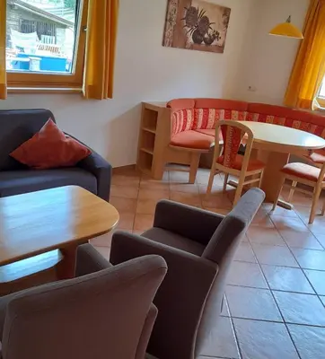 Ein Sitzbereich in der Unterkunft Appartement Hochmuth