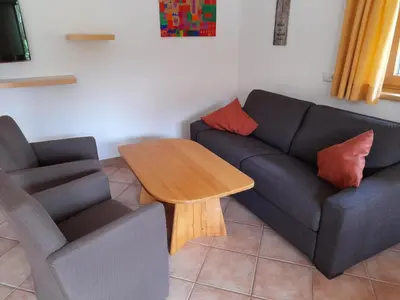 Ein Sitzbereich in der Unterkunft Appartement Hochmuth