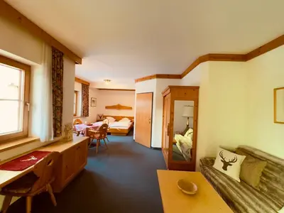 Ein Sitzbereich in der Unterkunft Residenz am Park