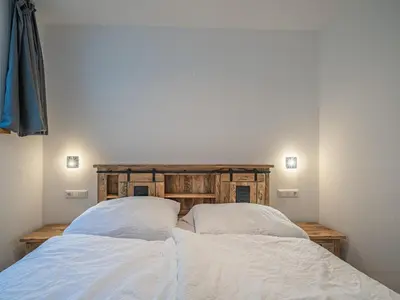 Ein Bett oder Betten in einem Zimmer der Unterkunft Haus Bergstille Top 1