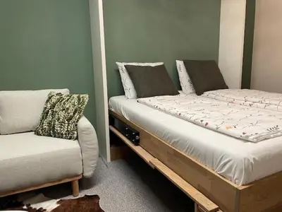 Ein Bett oder Betten in einem Zimmer der Unterkunft Saalbacher Real Top 3