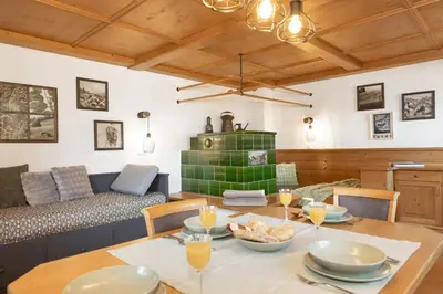 Ein Sitzbereich in der Unterkunft ZuHaus Gruab - Dog Friendly Tyrolean Apartment with fireplace Wildshönau Premiumcard