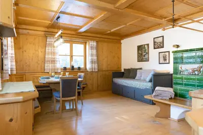 Ein Sitzbereich in der Unterkunft ZuHaus Gruab - Dog Friendly Tyrolean Apartment with fireplace Wildshönau Premiumcard