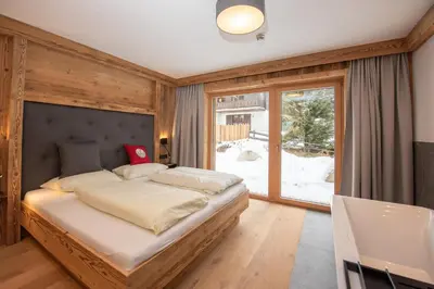 Ein Bett oder Betten in einem Zimmer der Unterkunft Chalet Königsleiten 297A