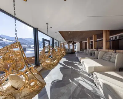 Ein Sitzbereich in der Unterkunft Bachgut, das Resort am Berg - Chalet 2