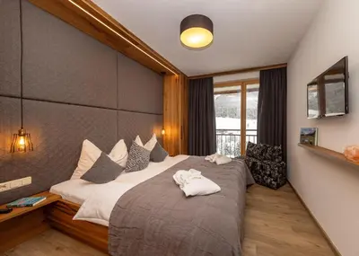 Ein Bett oder Betten in einem Zimmer der Unterkunft Bachgut, das Resort am Berg - Chalet 3