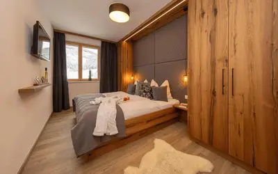 Ein Bett oder Betten in einem Zimmer der Unterkunft Bachgut, das Resort am Berg - Chalet 6