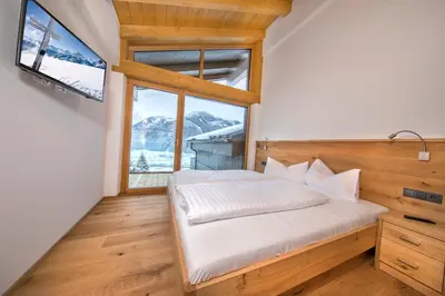 Ein Bett oder Betten in einem Zimmer der Unterkunft Wellnesschalet Tauern Juwel