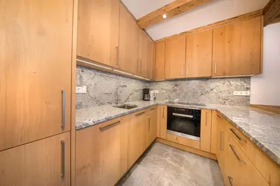 Küche/Küchenzeile in der Unterkunft Wellnesschalet Tauern Juwel