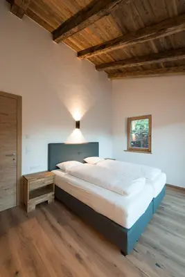 Ein Bett oder Betten in einem Zimmer der Unterkunft Chalet Wegmacher