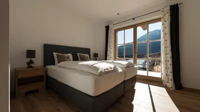 Ein Bett oder Betten in einem Zimmer der Unterkunft Chalet Wegmacher