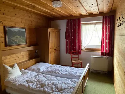 Ein Bett oder Betten in einem Zimmer der Unterkunft Gästehaus Hölzlbauer