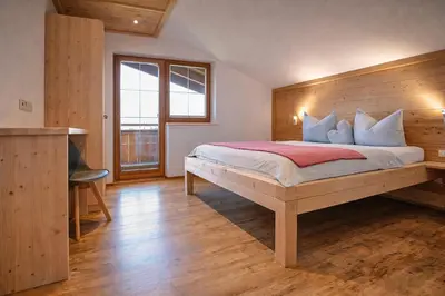 Ein Bett oder Betten in einem Zimmer der Unterkunft HOCHEBEN - by AlpenLuxus Collection
