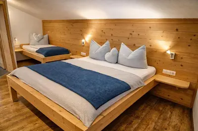 Ein Bett oder Betten in einem Zimmer der Unterkunft HOCHEBEN - by AlpenLuxus Collection