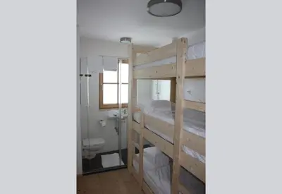 Ein Bett oder Betten in einem Zimmer der Unterkunft Penthouse JenSen