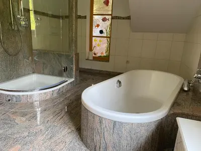 Ein Badezimmer in der Unterkunft Alpenwald