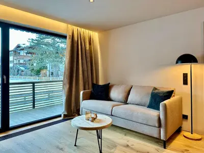 Ein Sitzbereich in der Unterkunft Alexander Mountain Suites