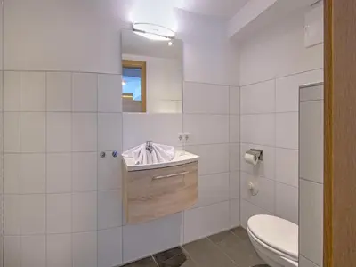 Ein Badezimmer in der Unterkunft Brunner Apartment on the ski slope