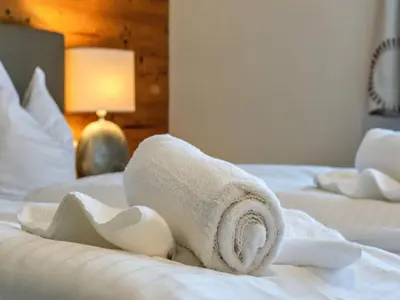 Ein Bett oder Betten in einem Zimmer der Unterkunft Wildschönau Alpine Ski Brunner Apartment