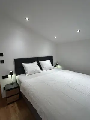 Ein Bett oder Betten in einem Zimmer der Unterkunft Mountainview-Lodge exklusiver Neubau mit Bergblick