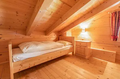 Ein Bett oder Betten in einem Zimmer der Unterkunft Chalet Königsleiten 167A