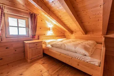Ein Bett oder Betten in einem Zimmer der Unterkunft Chalet Königsleiten 167A